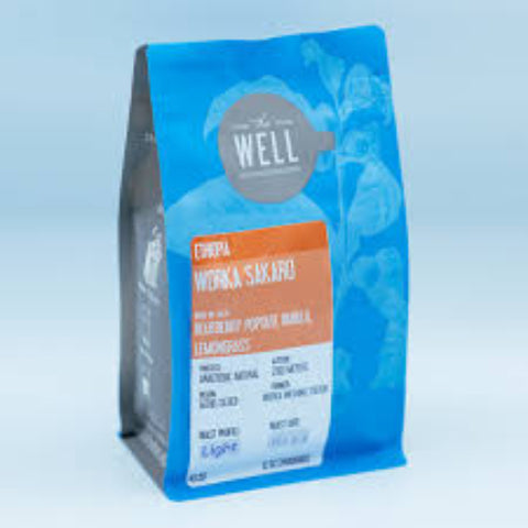 A bag of Well House Coffee ground coffee with a label indicating it is a rustic blend from Ethiopia and Central America, dark roast, 12oz size.